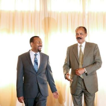 Eritrea's President, Isaias Afwerki talks to Ethiopia's Prime Minister, Abiy Ahmed during the Inauguration ceremony marking the reopening of the Eritrean Embassy in Addis Ababa, Ethiopia July 16, 2018. 