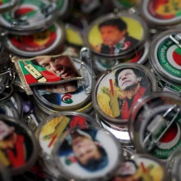 Pins with images of Imran Khan are pictured after the general election in Islamabad, Pakistan, July 26, 2018.