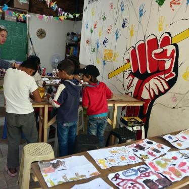 Children seeking asylum attend an art class at the volunteer-run Refugee Education Chios center on the Greek island of Chios on September 29, 2016. 