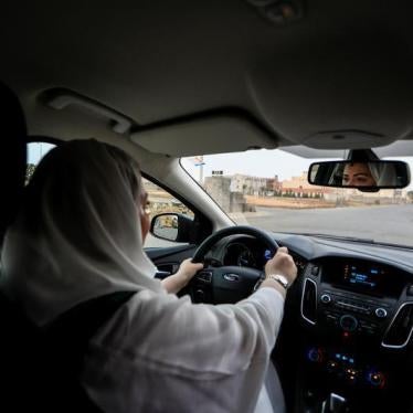 A Saudi woman drives around the side roads of a neighborhood in Jeddah, Saudi Arabia, June 21, 2018. © 2018 Reuters/Zohra Bensemra