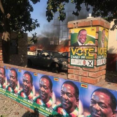 Cars burning at ZANU-PF Harare Provincial Offices following violent protests on August 1, 2018.