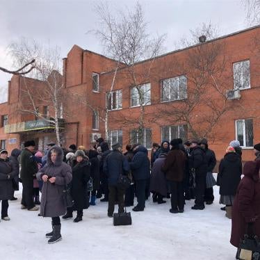 Pensioners queuing in front of a state bank branch in government-controlled Stanitsa Luhanska. March 22, 2018.