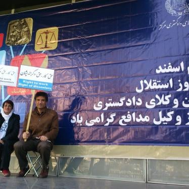 Human rights lawyer Nasrin Sotoudeh and Farhad Meysami, a human rights defender, protest the suspension of  Sotoudeh's law license in front of the Tehran bar association in Tehran, February 2015. 