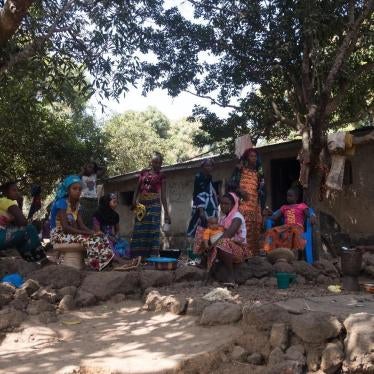 Women prepare food in Hamdallaye village in the Boké region. Compensation payments for land lost to mining are often paid to male heads of household or linages, even where the land is utilized by entire families or households. January 2018. 