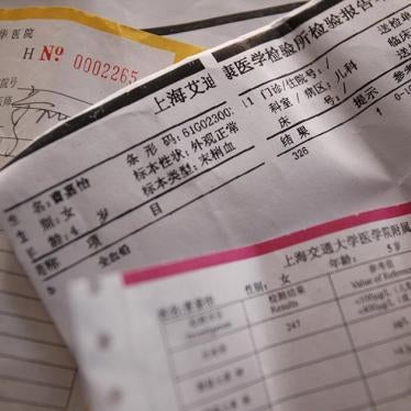 Test reports of lead levels of families in Kanghua New Village are shown Thursday, Sept. 15, 2011 in Shanghai, China.