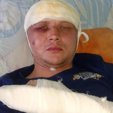 Trade union leader, Dmitry Senyavskii, in hospital, November 11, the day after unidentified assailants viciously attacked him in his garage. 