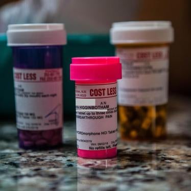 Maria Higginbotham’s medication bottles, including hydromorphone, an opioid she uses for breakthrough pain. 