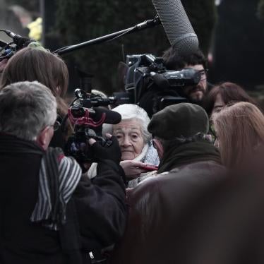 Ascensión Mendieta enters the cemetery where her father’s remains have are buried in a mass grave.