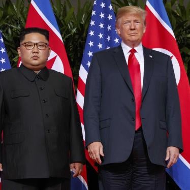 U.S. President Donald Trump meets with North Korean leader Kim Jong Un on Sentosa Island, in Singapore on June 12, 2018. © 2018 AP Photo /Evan Vucci