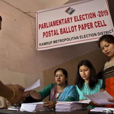 Government officers distribute postal ballot papers to a election presiding officer ahead of the country's general elections in Gauhati, India, Tuesday, March 19, 2019. 