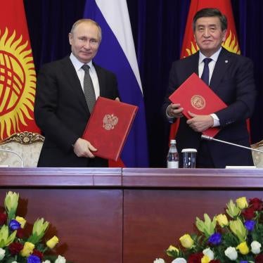 Russian President Vladimir Putin, left, and Kyrgyzstan's President Sooronbai Jeenbekov pose after a signing ceremony in Bishkek, Kyrgyzstan on March 28, 2019. 