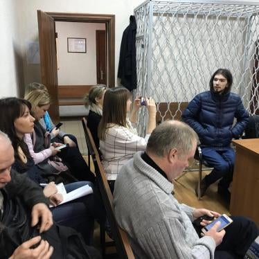Ivan Luzin at the table with his lawyer Aleksandr Dobralsky in the Tsentralny District Court in Kaliningrad, February 25, 2019.