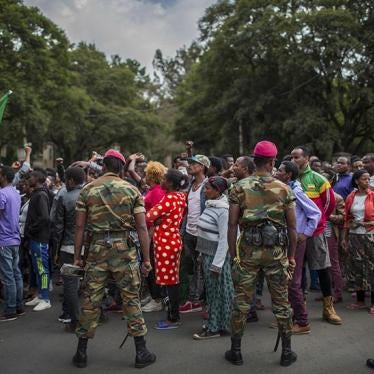Ethiopian army soldiers attempt to control protestors from the capital and those displaced by ethnic-based violence over the weekend in Burayu, as they demonstrate to demand justice from the government in Addis Ababa, Ethiopia Monday, Sept. 17, 2018.