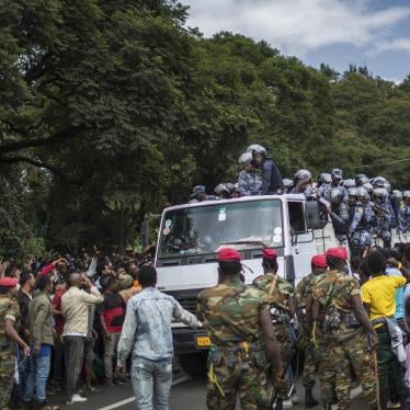 Members of the army and riot police attempt to control protestors from the capital and those displaced by ethnic-based violence over the weekend in Burayu, as they demonstrate to demand justice from the government in Addis Ababa, Ethiopia Monday, Sept. 17