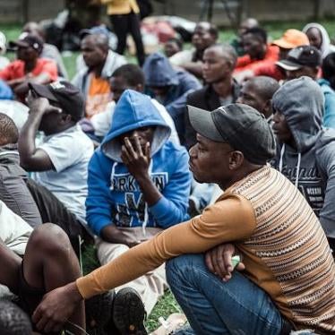 Hundreds of foreign nationals displaced by xenophobic attacks in Durban on March 27, 2019  take refuge near the Sydenham Police Station. © 2019 RAJESH JANTILAL/AFP/Getty Images. 