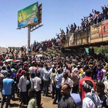 Protesters rally in front of the military headquarters in the capital Khartoum, Sudan, Monday, April 8, 2019. 