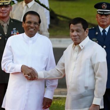 Visiting Sri Lanka President Maithripala Sirisena, left, and Philippine President Rodrigo Duterte shake hands following the welcoming ceremony Wednesday, Jan. 16, 2019, at the Presidential Palace grounds in Manila, Philippines. 