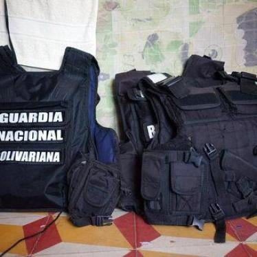 Chest vests belonging to defected members of Venezuela's Bolivarian National Guard sit in room where they are sleeping at a shelter run by a priest in Cucuta, Colombia, Monday, Feb. 25, 2019.