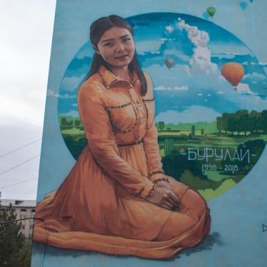 Burulai Turdaaly kyzy’s portrait on a building at the medical college she attended in Bishkek, November 2018.