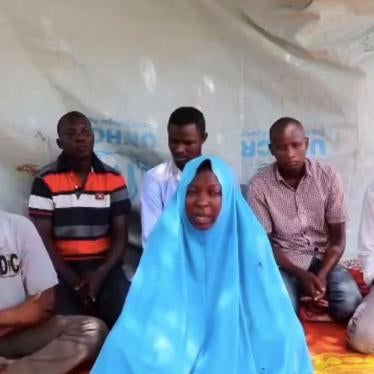 A screen grab taken from a video released on July 25, 2019 allegedly showing a female aid worker from Action Against Hunger and five male colleagues kidnapped in an attack in northeast Nigeria last week.