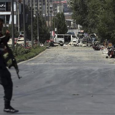 A security forces soldier arrives at the site of an explosion in Kabul, Afghanistan