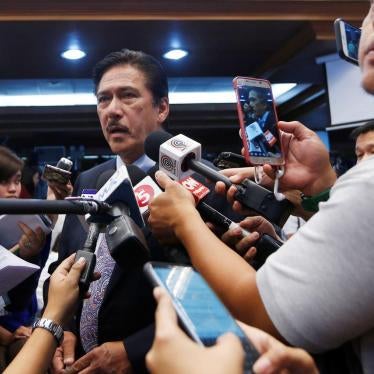 Senate president Vicente Sotto III talks to the media in this May 2018 photo. Sotto, a staunch supporter of President Rodrigo Duterte, filed the bill against "false news" on July 1, 2019. 