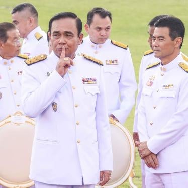 Thailand's Prime Minister Prayut Chan-o-cha arrives for a group photo with his cabinet members at the government house in Bangkok.  © 2019 Vichan Poti/Pacific Press/Sipa USA via AP Images