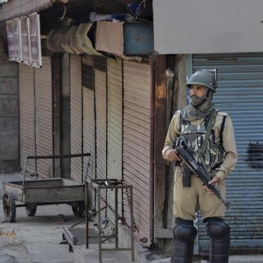 A paramilitary trooper stands guard during shutdown in Srinagar, Kashmir. 