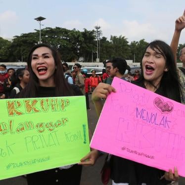 LGBT activists protest the planned revision to Indonesia’s criminal code outside parliament in Jakarta, Indonesia, February 12, 2018.