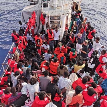 Migrants are crowded together on deck of the rescue ship "Eleonore" as it seaches for a safe port in the Mediterranean.