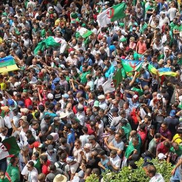 On July 5 2019, thousands of people protested for a twentieth consecutive week in Algeria's capital, defying a major police presence just days before the mandate of interim president Bensalah expires. © AFP/Getty Images