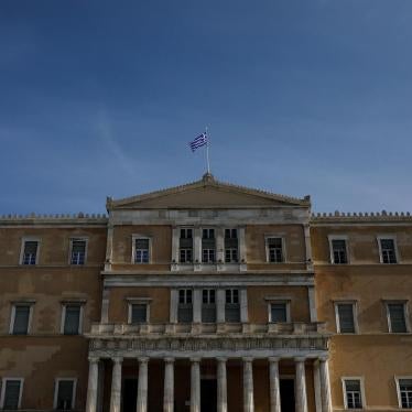 A Greek national flag flutters atop the parliament building in Athens, Greece, January 28, 2019.