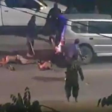 Screenshot of Papua New Guinean police officers violently beating three men on a street in Port Moresby, Papua New Guinea shared on social media on November 4, 2019. 