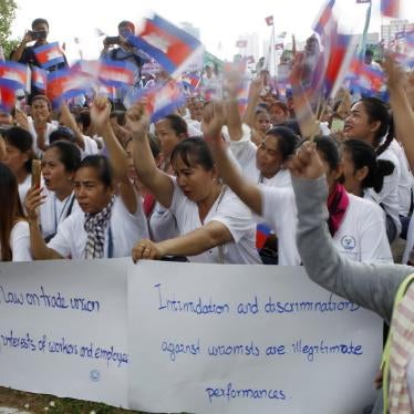 Cambodian workers gather to mark May Day at Tonle Sap river bank, in Phnom Penh, Cambodia, Wednesday, May 1, 2019. Some hundreds of workers staged a rally, demanding a better working condition