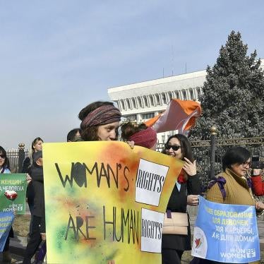 People march through the center of Kyrgyzstan's capital Bishkek for International Women's Day, March 8, 2019.