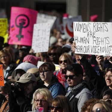 Protesters gather to participate in a Women's March highlighting demands for equal rights and equality for women, Saturday, Jan. 20, 2018, in Cincinnati, Ohio.