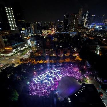Participants of Pink Dot, an annual event organized in support of the LGBT community, call for the repeal of Section 377A of Singapore’s Penal Code, June 29, 2019.