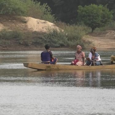 Three people in a canoe