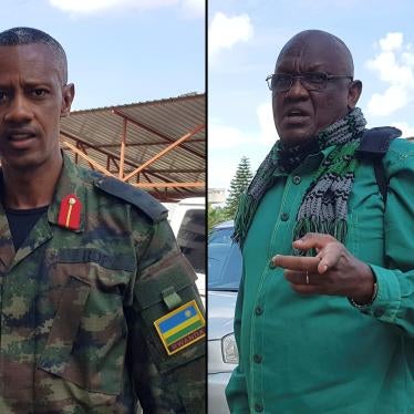 Colonel Tom Byabagamba (left) and retired Brigadier General Frank Rusagara (right) arrive at the court to appeal their 2016 conviction on charges including tarnishing the government’s image and inciting insurrection, in Kigali, Rwanda, on December 27, 201
