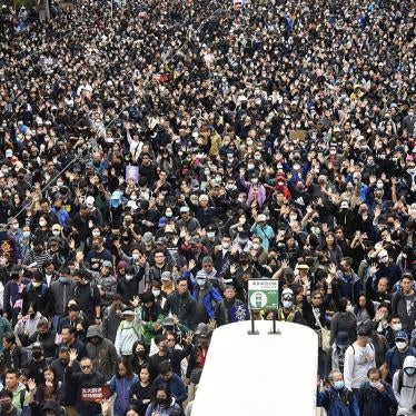 Thousands of protesters march at an avenue in Victoria, Hong Kong Island, Hong Kong on January 1, 2020.