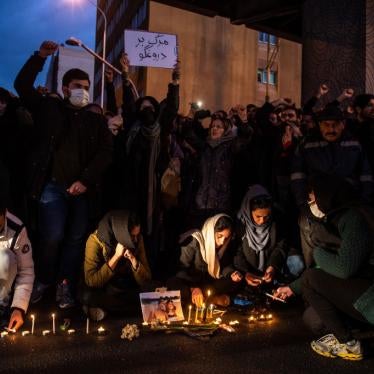 Mourners light candles while gathering during a vigil for the victims of the Ukraine International Airlines flight that was unintentionally shot down by Iran, in Tehran, Iran, on Saturday, Jan. 11, 2020. 