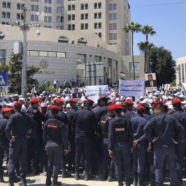 Security forces block a road as teachers protest in Amman, Jordan, September 5, 2019. 