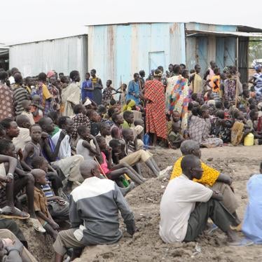 Victims of ethnic violence in Jonglei, state, South Sudan, wait in line at the World Food Program distribution center in Pibor to receive emergency food rations, January 12, 2012.