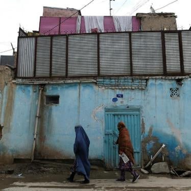 Women walk along a street in the old part of Kabul February 29, 2020. 