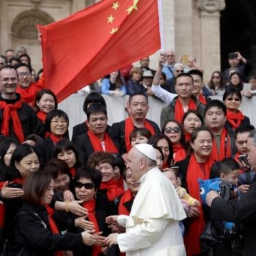 Pope Francis meets a group of faithful from China at the end of his weekly general audience in St. Peter's Square, at the Vatican, April 18, 2018.