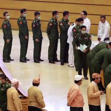 Military and civilian members of parliament vote on proposed amendments to the 2008 Constitution, Naypyidaw, March 10, 2020.