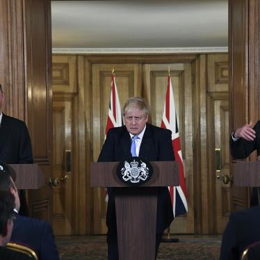 From left, Chief Medical Officer for England Chris Witty, Britain's Prime Minister Boris Johnson and Chief Scientific Adviser Patrick Vallance speak during a press conference about coronavirus in 10 Downing Street in London, Monday, March 9, 2020.
