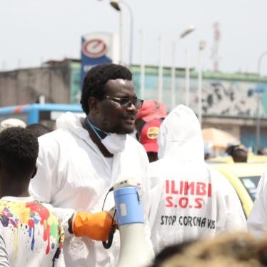 Pro-democracy activists from Filimbi movement raise awareness about the COVID-19 pandemic in Kinshasa’s Gambela market, Democratic Republic of Congo, March 28, 2020.