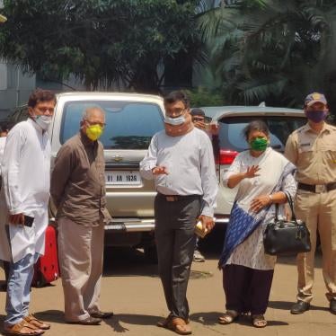 Activist Anand Teltumbde (center), before he surrendered to the National Investigative Agency in Mumbai, on April 14, 2020. © Parth MN