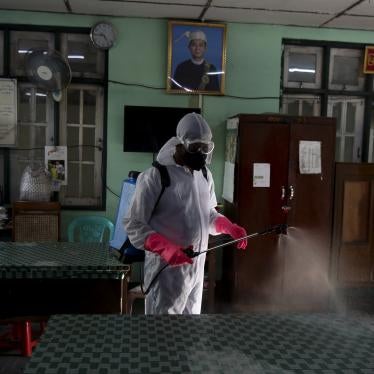 A member of the Yangon City and Development Committee disinfects government offices to help curb the spread of the new coronavirus in Yangon, Myanmar Wednesday, March 25, 2020. 